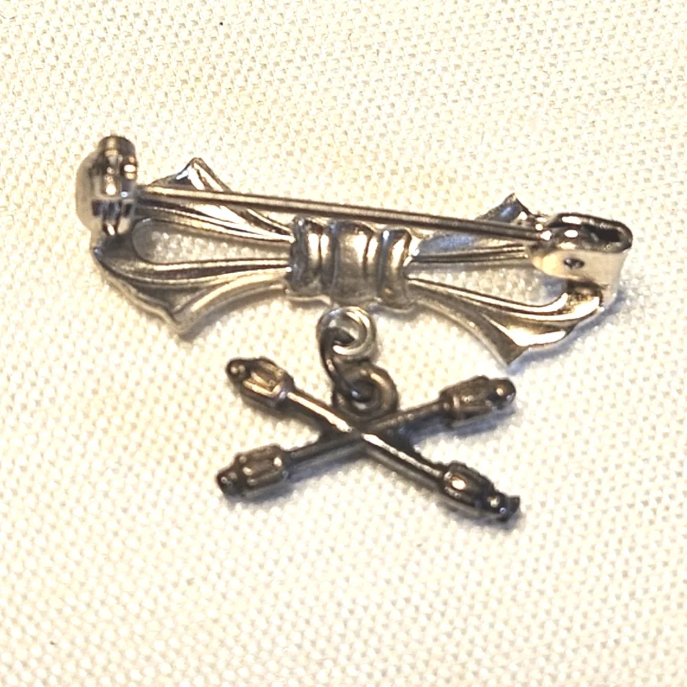 Vintage Silver-Tone Bow Pin with Crossed Batons Charm